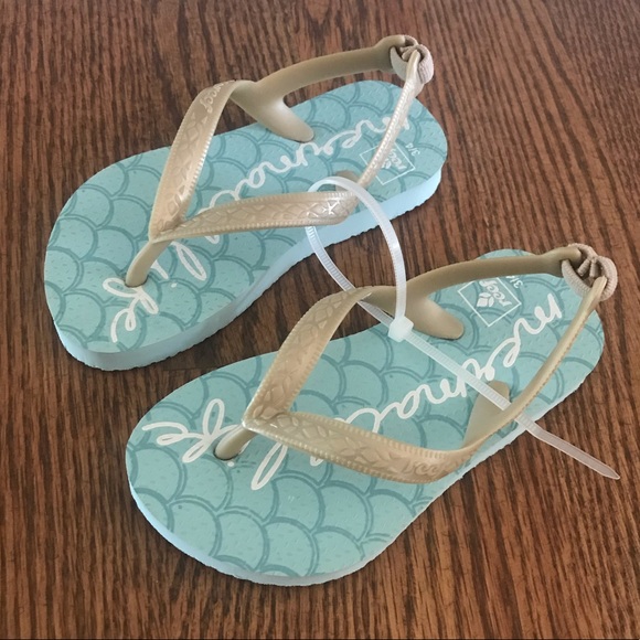 reef mermaid flip flops